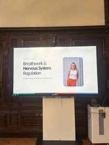 Charlotte Grysolle leading a breathwork and nervous system regulation workshop at Sofina in Brussels